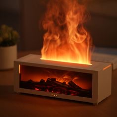 Fireplace simulation flame humidifier